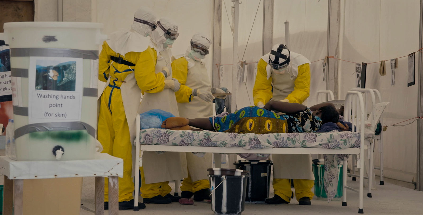 A patient is being treated at an MSF Ebola treatment centre.